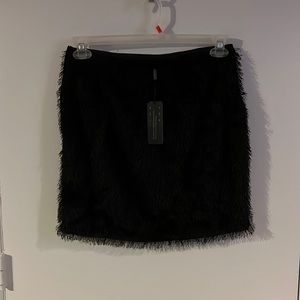 Kardashian black fur shirt very soft. NWT size medium.
